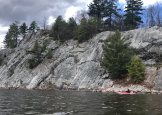 StayingLakesiderock face kayak 960x680