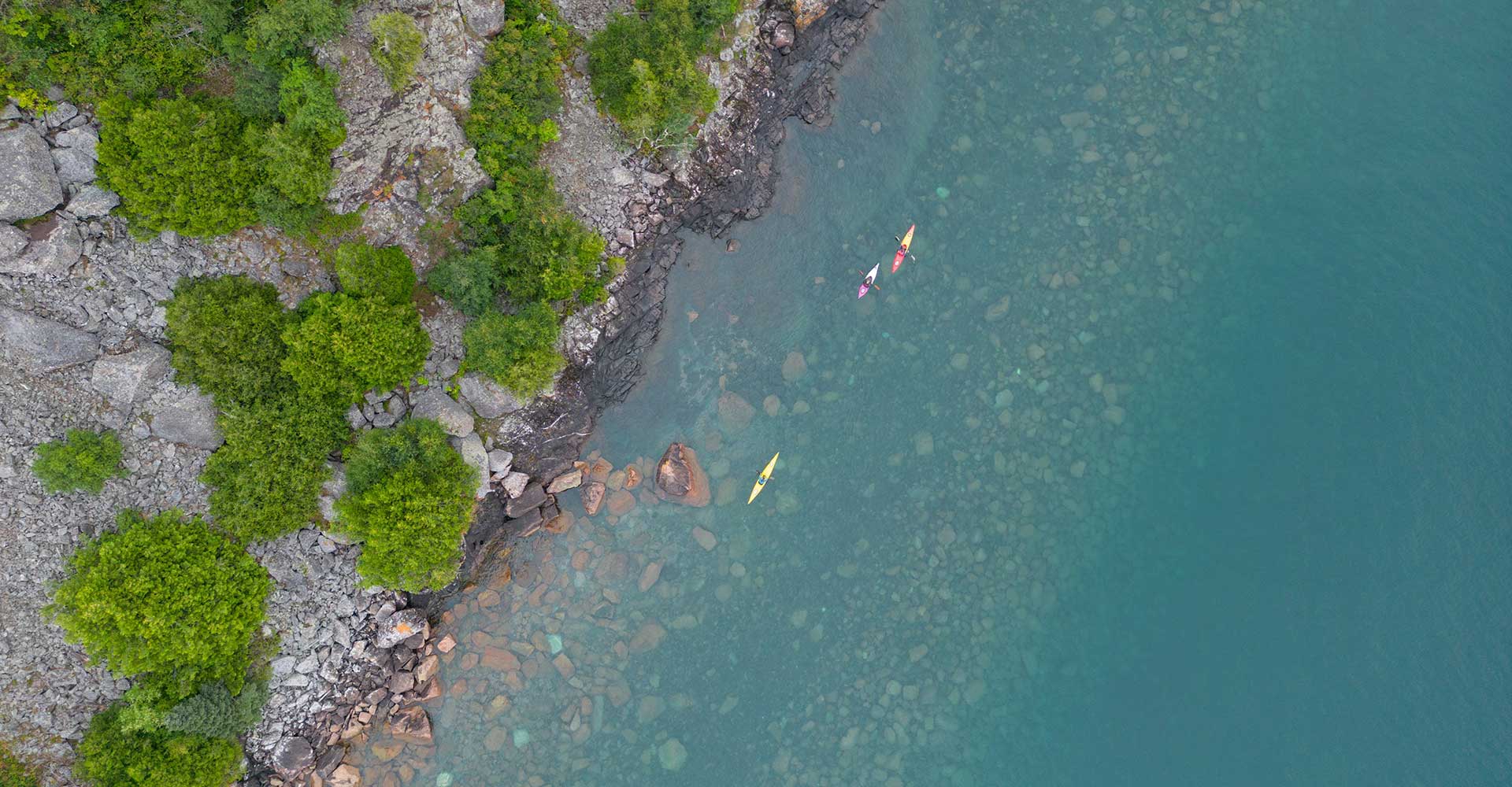 cfield-drone-kayaks-coastline